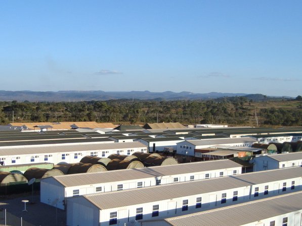 Rows of modular accommodation blocks at a large remote workforce camp